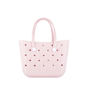 Pink waterproof EVA beach tote bag featuring diamond pattern and circular holes