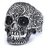 Detailed close-up of a vintage punk gothic skull ring in a retro silver finish