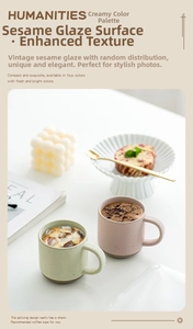 Detailed view of matte speckled ceramic espresso cups with vintage contrasting bases