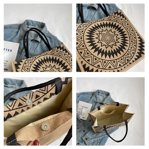 Detail showing magnetic buckle closure and inner zipper pocket of the linen tote bag