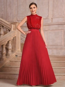 Elegant sleeveless red pleated evening gown with sequin bodice and a high neckline finish