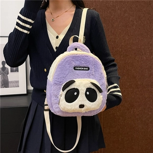 Detail of plush purple kids backpack with a cute white panda pocket and fuzzy texture