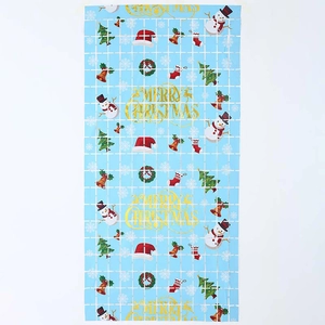 Blue Christmas tablecloth with Merry Christmas text and festive snowman patterns