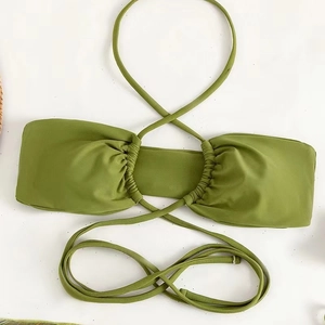 Lime green halter bikini top with criss-cross straps and pleated texture for beachwear