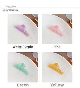 Detail display of glitter dolphin hair claw clips in lavender, pink, green, and yellow