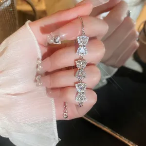 Sparkling zircon bowknot adjustable bracelet in silver with refined slider closure