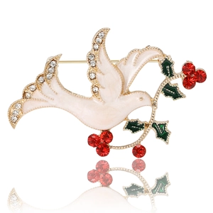 Enamel peace dove brooch with red crystal berry and white wings on white background