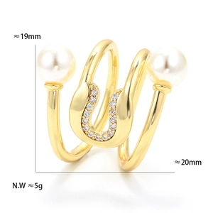 Detail view of gold geometric ring with pearl and zircon showing 19-20mm dimensions