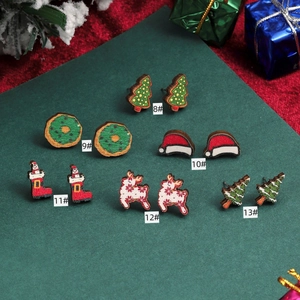Collection of festive Christmas wooden stud earrings featuring trees, deer and gift motifs