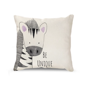 Linen cushion cover with cute cartoon zebra print and BE UNIQUE text on white background