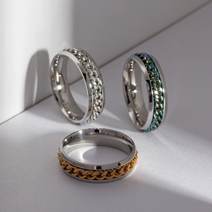 6mm stainless steel spinner ring with rotating chain in silver, gold, and rainbow colors