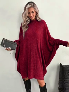 Detail of burgundy batwing sleeve knit dress with high collar and ribbed texture