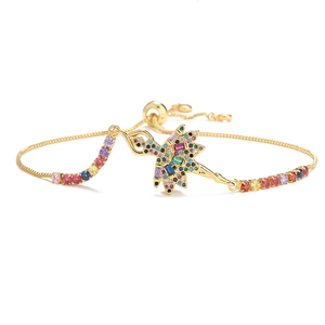 Gold-plated ballerina bracelet featuring multi-color zircons and adjustable pull chain