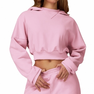 Pink two-piece hooded crop top and jogger set for women's outdoor fitness and casual wear