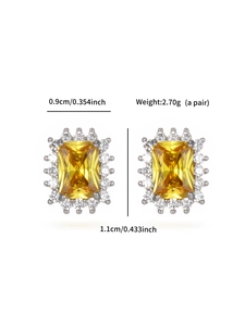 Detail view of yellow gemstone stud earrings with rectangular cut and size measurements