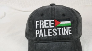 Detailed view of Free Palestine embroidery on vintage black washed cotton baseball cap