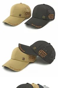 Detail showing laser-cut ventilation holes and GKVO embroidery on khaki and black caps