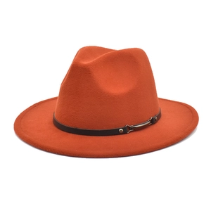 Detail of orange fedora wool hat featuring a brown leather belt with metal buckle