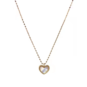Elegant gold heart pendant necklace with white shell inlay and beaded edge on white background
