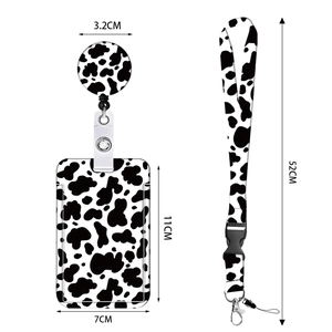 Cow print lanyard set with retractable badge holder and card sleeve showing dimensions