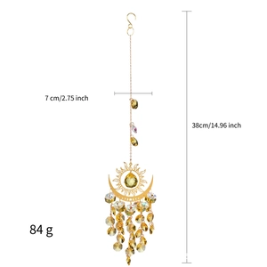 Detail of evil eye sun moon crystal suncatcher wind chime showing 38cm total length