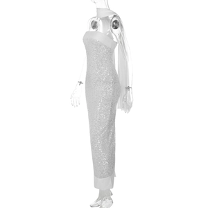 Detailed view of shimmering white sequins on a strapless floor-length evening gown