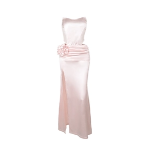 Pink satin strapless evening gown with floral waist detail and high side slit