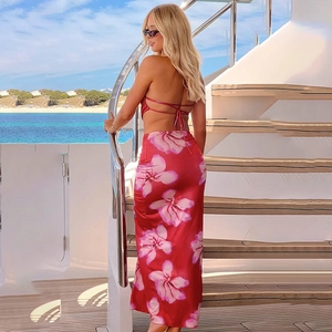 Red floral print two-piece maxi dress set with halter neck top and long slim skirt