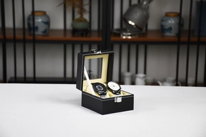 Detail view of 2-slot black PU leather watch box with white stitching and clear window