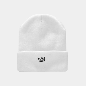 Close-up of white knitted beanie with black crown embroidery and soft ribbed texture