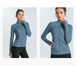 Close-up of slim-fit yoga jacket with S-curve stitching and functional thumbholes