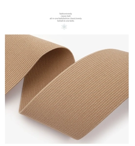 Macro detail of khaki elastic woven belt showing high-density twill texture and flexibility