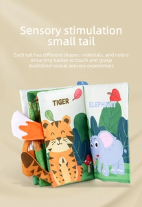 Detail of baby cloth book with multi-textured 3D animal tails and sensory labels