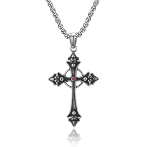 Retro titanium steel cross necklace with inlaid red garnet stone on white background