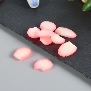 Macro detail of artificial pink and white gradient flower petals for wedding decor