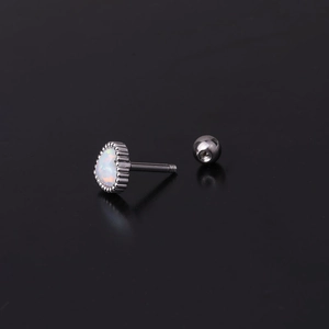 Macro shot of 16G silver stainless steel stud featuring a teardrop white opal and screw back