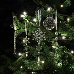 Clear acrylic snowflake and icicle Christmas tree ornaments set with warm led lights