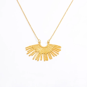Macro view of a 18k gold plated stainless steel fan pendant with a fine link chain
