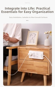 Self-adhesive power strip holder mounted on wood bedside table for organized cable management