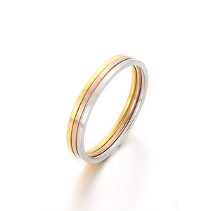 Polished three-tone interlocking stainless steel band rings in gold, silver, and rose gold