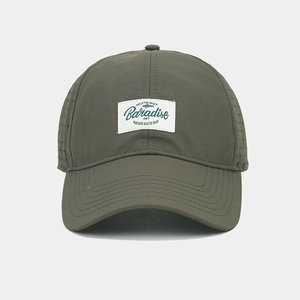 Detail of army green quick-dry baseball cap featuring laser-cut breathable side holes