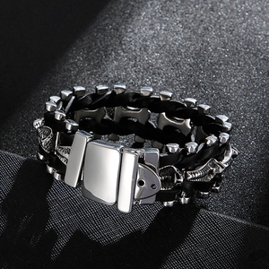 Men's heavy duty stainless steel cobra bracelet with black braided cord in biker style