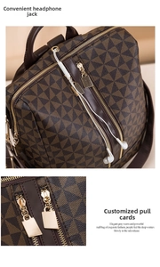 Detail of brown geometric printed backpack featuring side earphone port and golden zipper