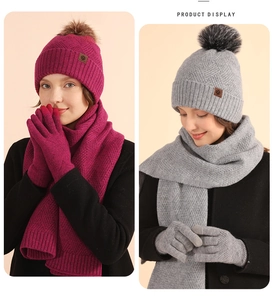 Knitted winter set for women including beanie with pompom, scarf and gloves in pink and grey