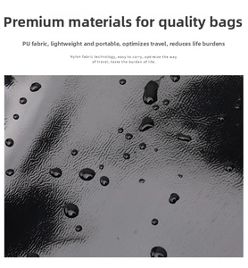 Detail shot of black waterproof PU leather fabric with clear water droplets on surface