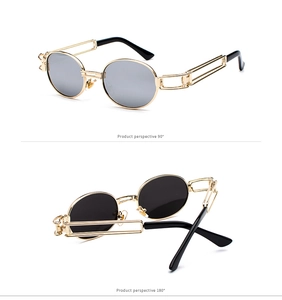 Macro detail of steampunk sunglasses featuring gold mechanical hollow temples and oval lenses