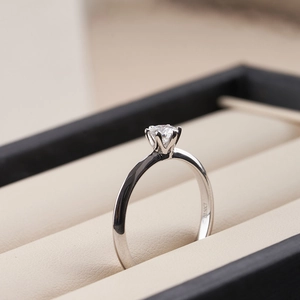 Macro shot of 0.50CT moissanite stone in classic six-prong setting on S925 silver ring