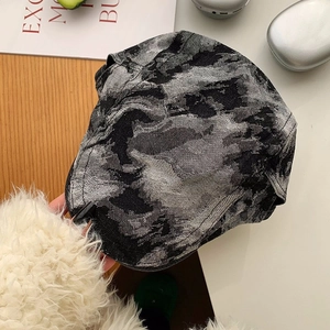 Flat lay of vintage plaid beret hat with embroidery detail and stylish lifestyle props
