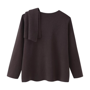 Close-up of dark brown knit cardigan featuring a stylish matching scarf collar detail