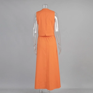 Rear view of orange cotton linen two-piece set featuring sleeveless crop top and maxi skirt